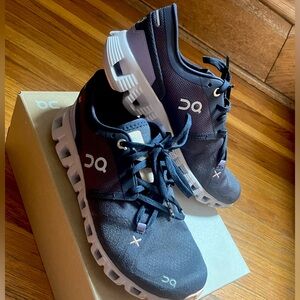 Gently used, like new, purple cloud, running shoes.